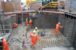 After a unique piling system was developed and implemented for this project, shotcrete containing KIM crystalline waterproofing admixture was applied to the slab and walls of the basement (Photo courtesy of Abbey Pynford - Basement Engineering Specialists)